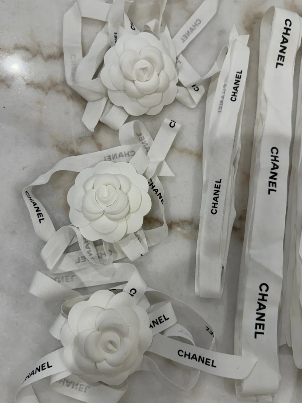 CHANEL White Ribbon Ties with White Camellia Flowers